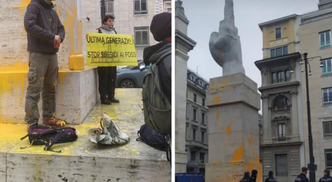 Ancora un blitz di Ultima Generazione. Imbrattato con vernice arancione “Il Dito” di Cattelan in Piazza Affari a Milano. I passanti attaccano gli attivisti: “È una vergogna”